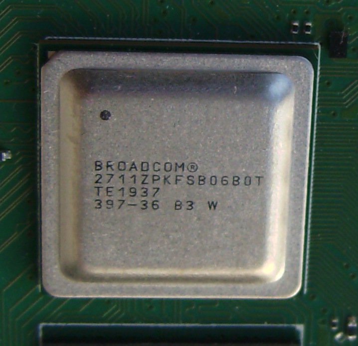 The Broadcom BCM2711 application processor of the Raspberry Pi 4: four Cortex-A72 cores, caches, and an external DRAM interface — a different world from the MCU.