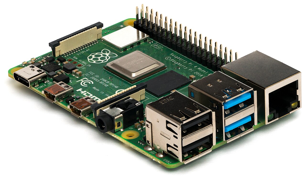 A Raspberry Pi 4 single-board computer. It runs Linux on a multi-core application processor — a different class of device from a microcontroller, as the next section explains.